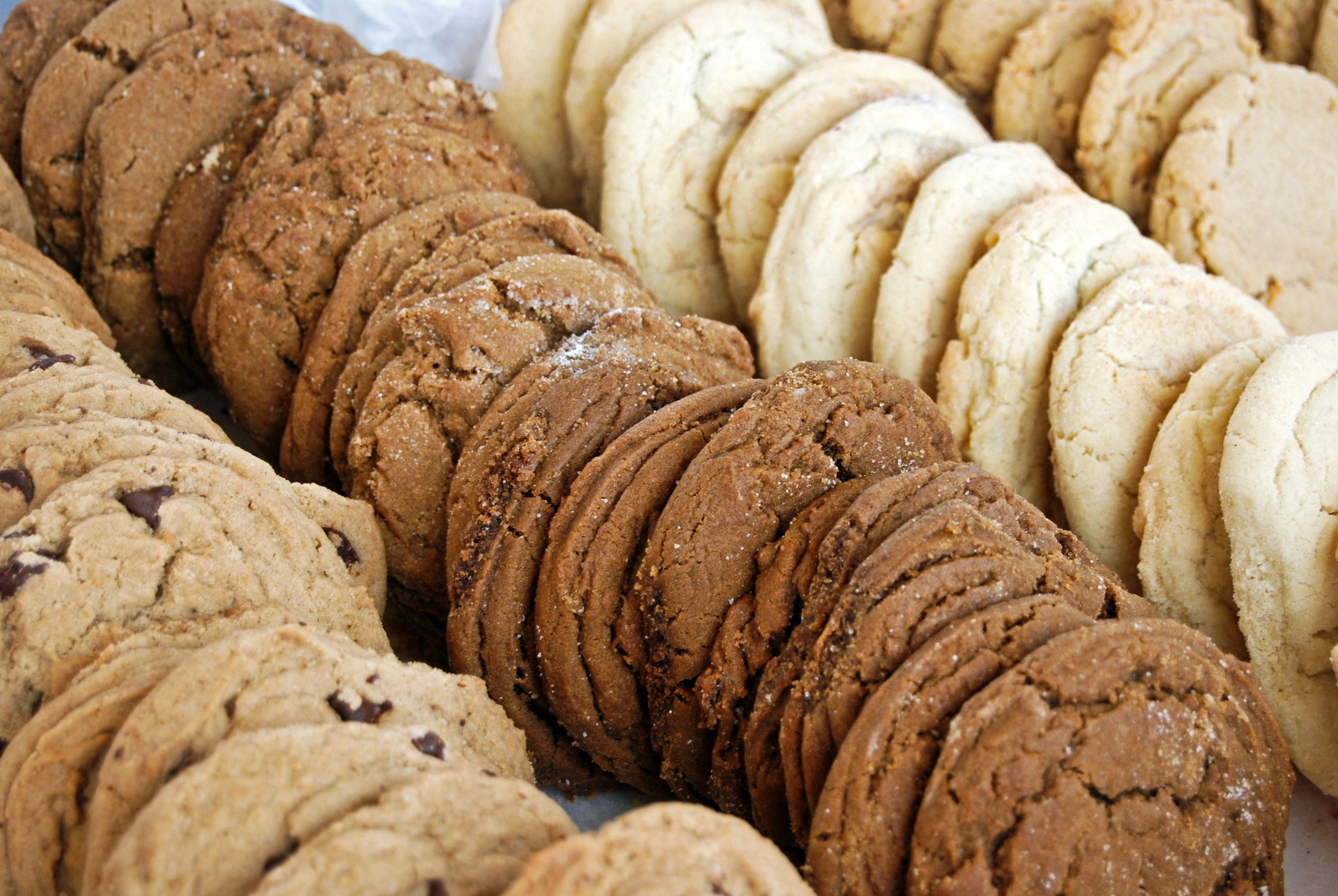 Various kinds of cookies arranged in a row